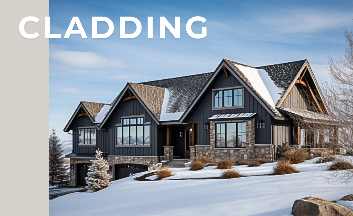 Wood Composite Cladding on Luxury Home in Winter Setting | FiberWood Modern home with black wood composite cladding and stone accents in a snowy landscape.