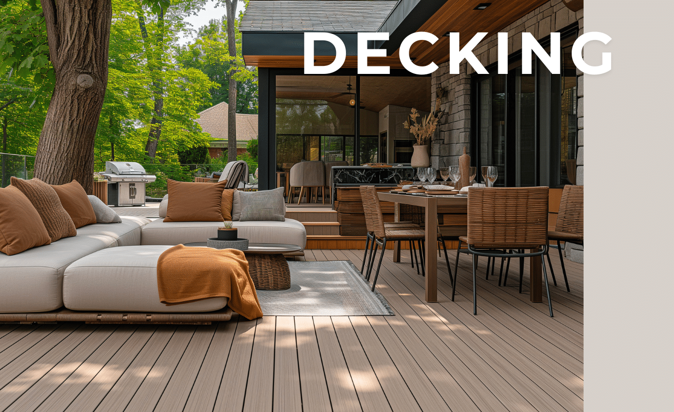 Composite Decking for Outdoor Living Spaces | FiberWood Outdoor patio with light wood composite decking, modern furniture, and a dining set surrounded by greenery.